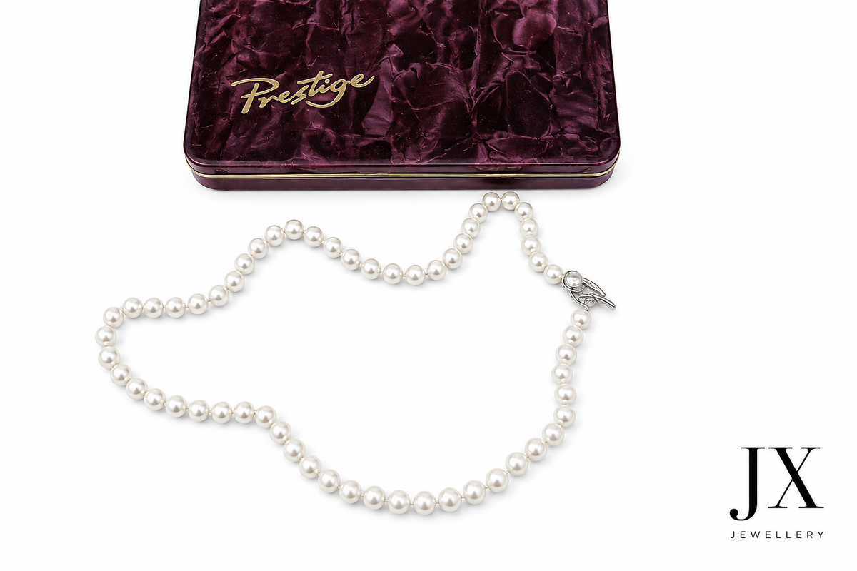 VINTAGE Single Strand Pearl Necklace by Prestige Jersey Pearls, with 9ct gold knotted clasp. In fitted box with outer cover.