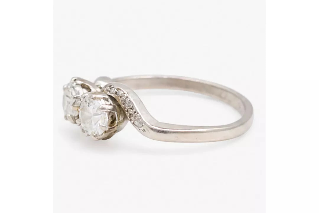 PRELOVED Platinum diamond crossover ring - approx 0.65ct