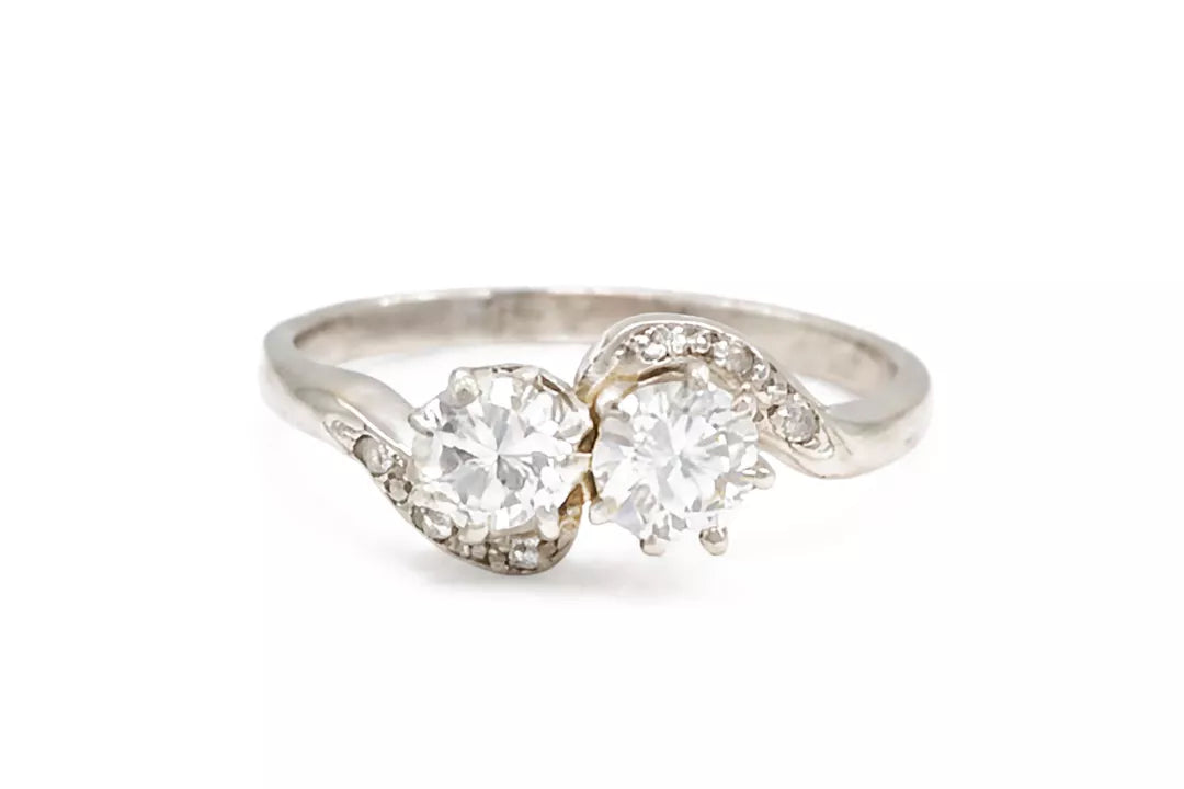 PRELOVED Platinum diamond crossover ring - approx 0.65ct