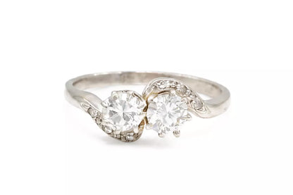 PRELOVED Platinum diamond crossover ring - approx 0.65ct