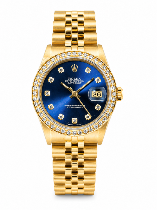 Rolex oyster perpetual dtaejust dold with bluel dial and diamond bezel